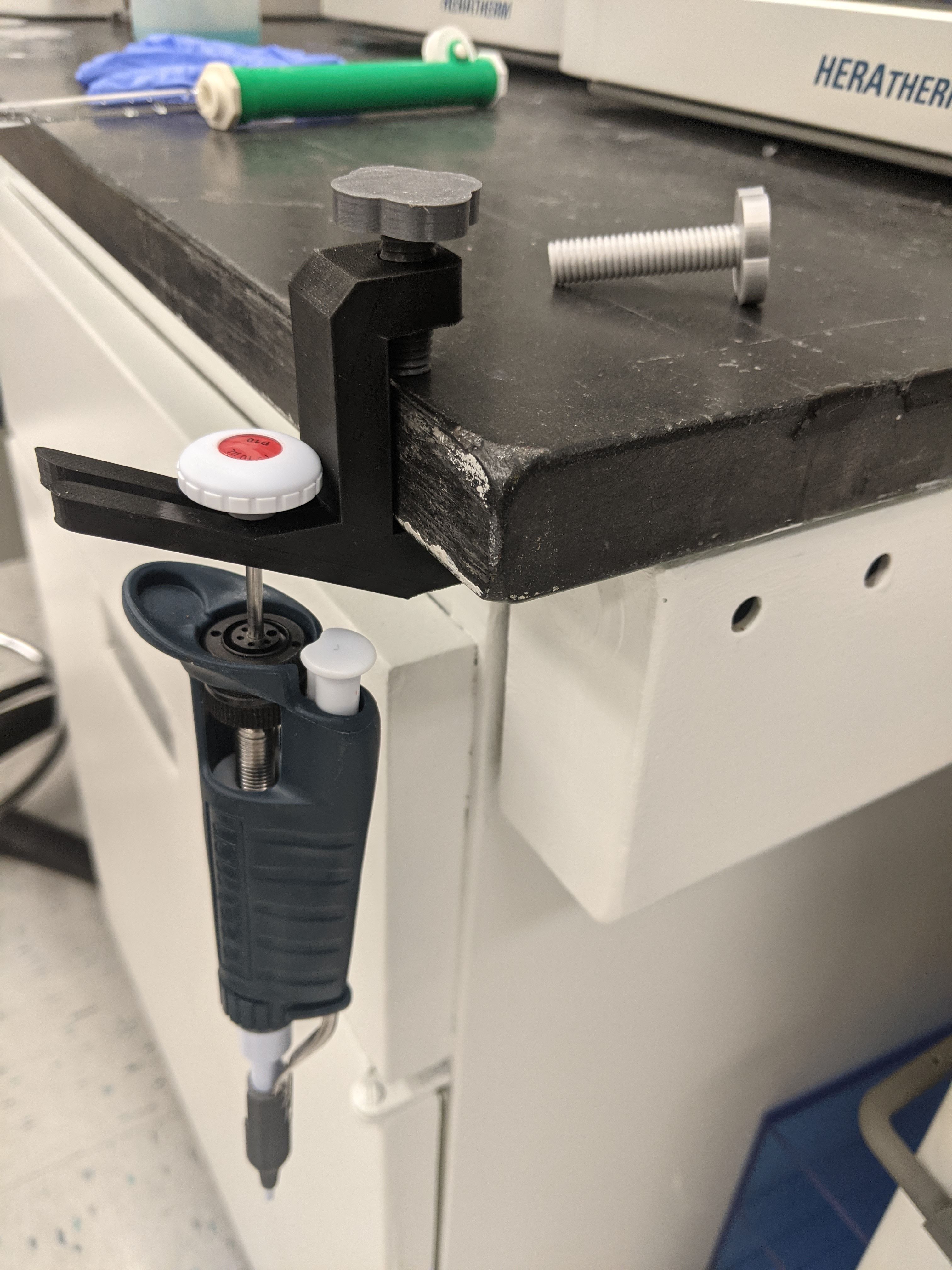The pipette holder with the adjustable screw