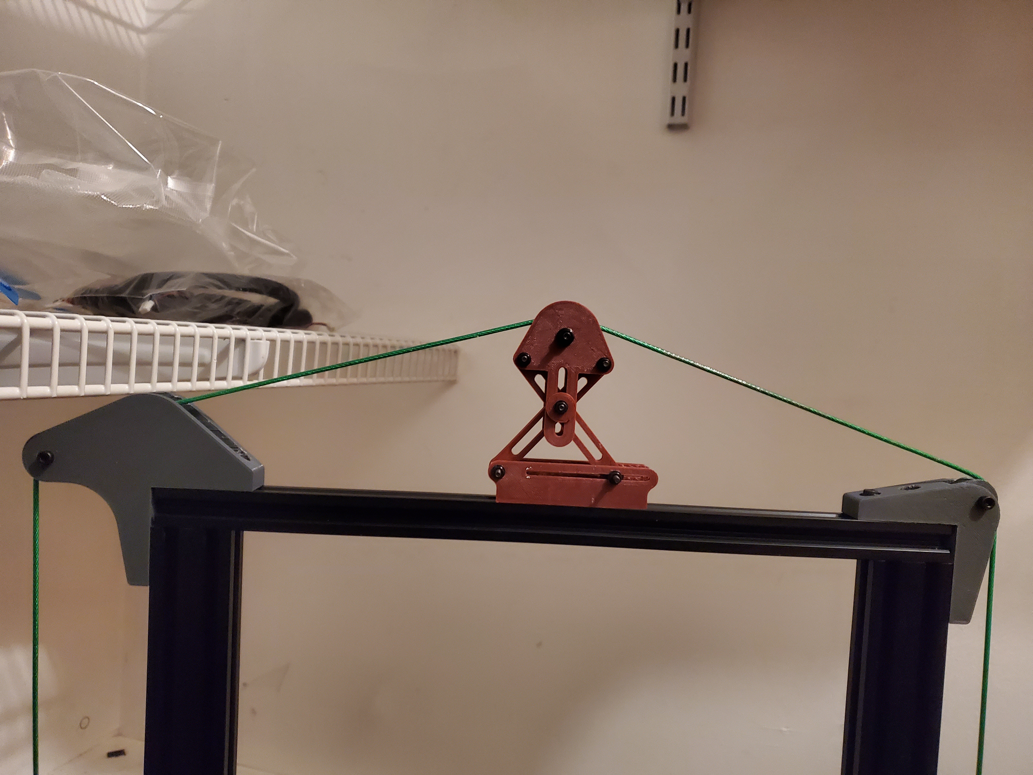 The cable tensioner mounted on the printer