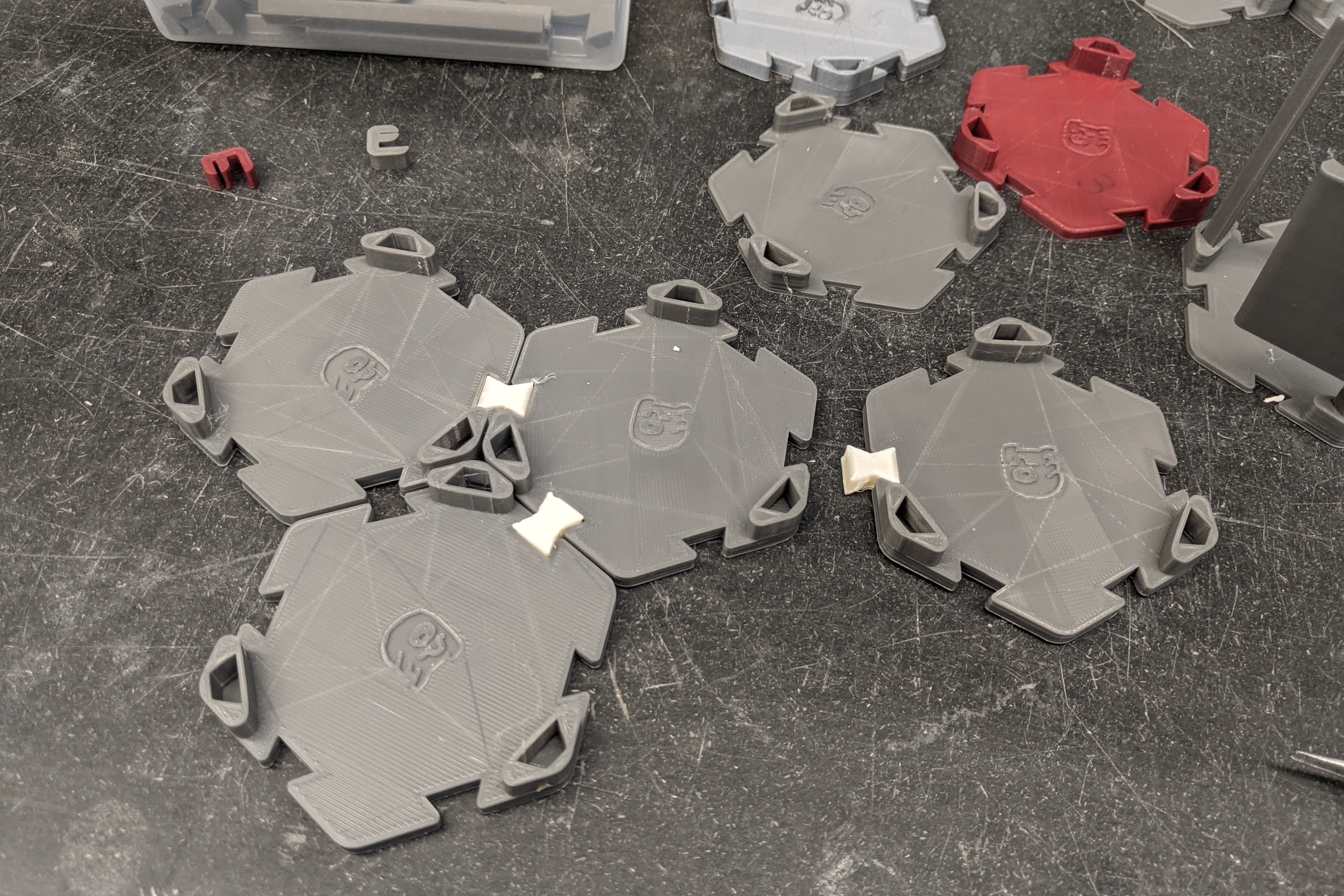 The hexagonal base being tiled by dovetail connectors