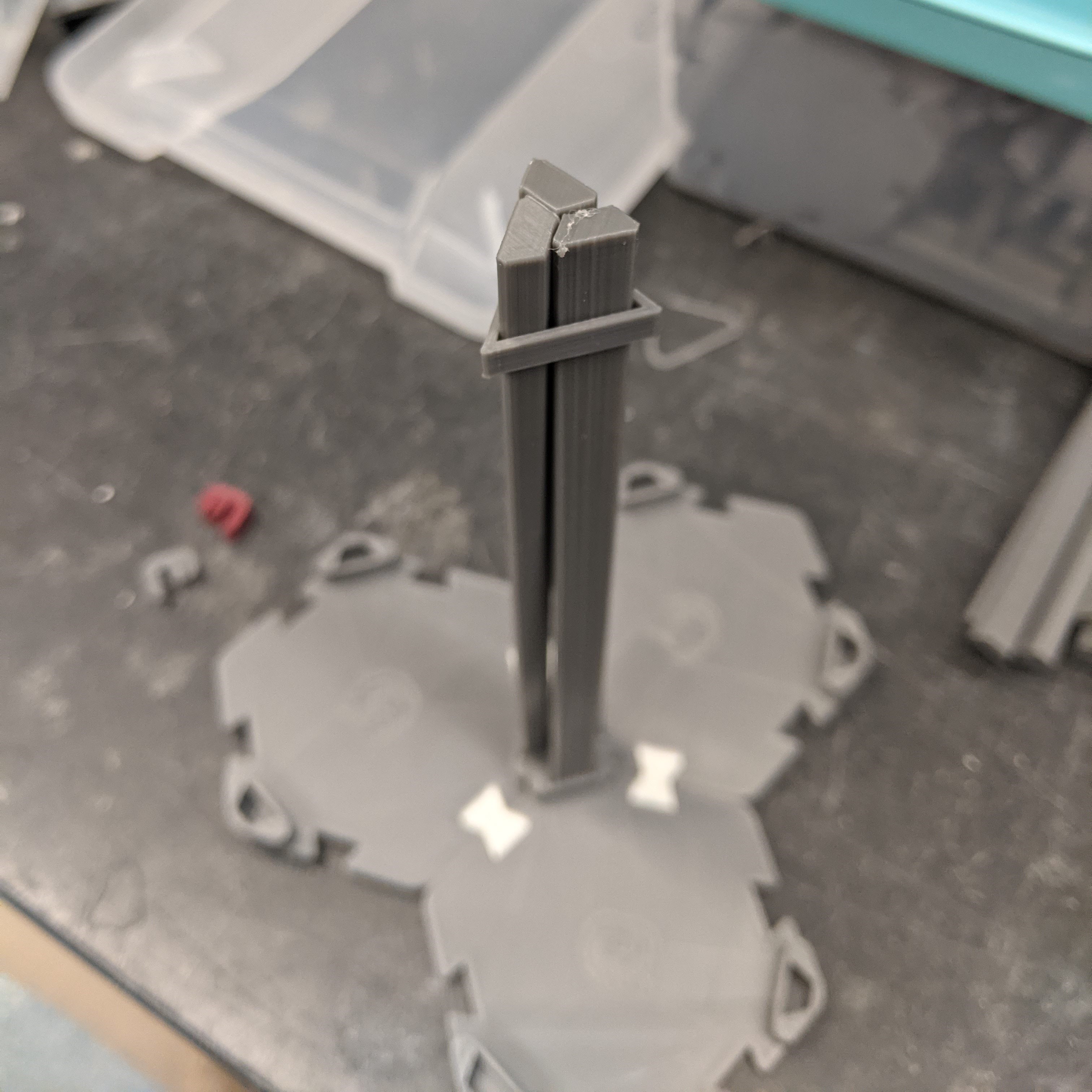 Vertical poles being interlocked by a ring