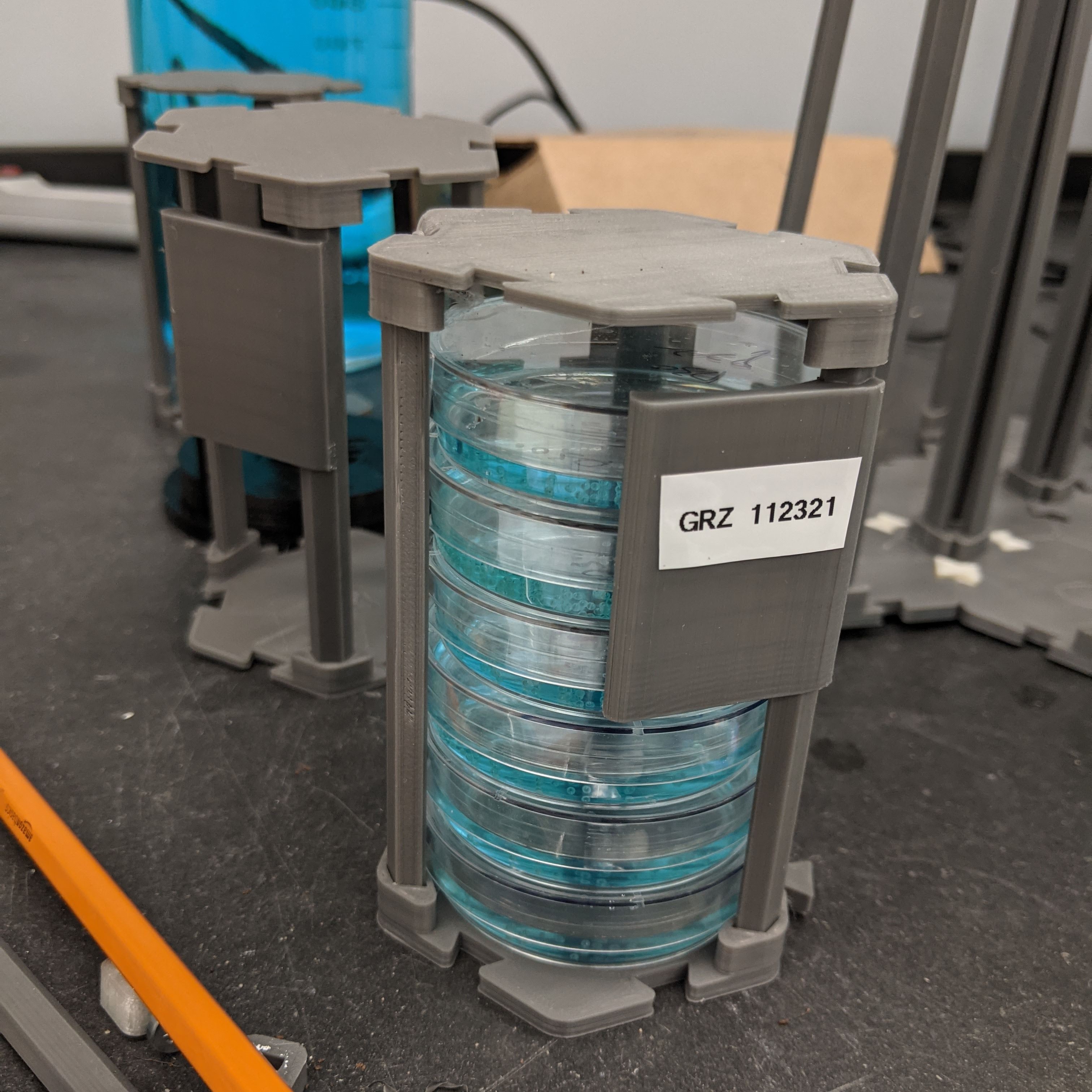 The lid securing the top of the holder and preventing the dishes from falling out