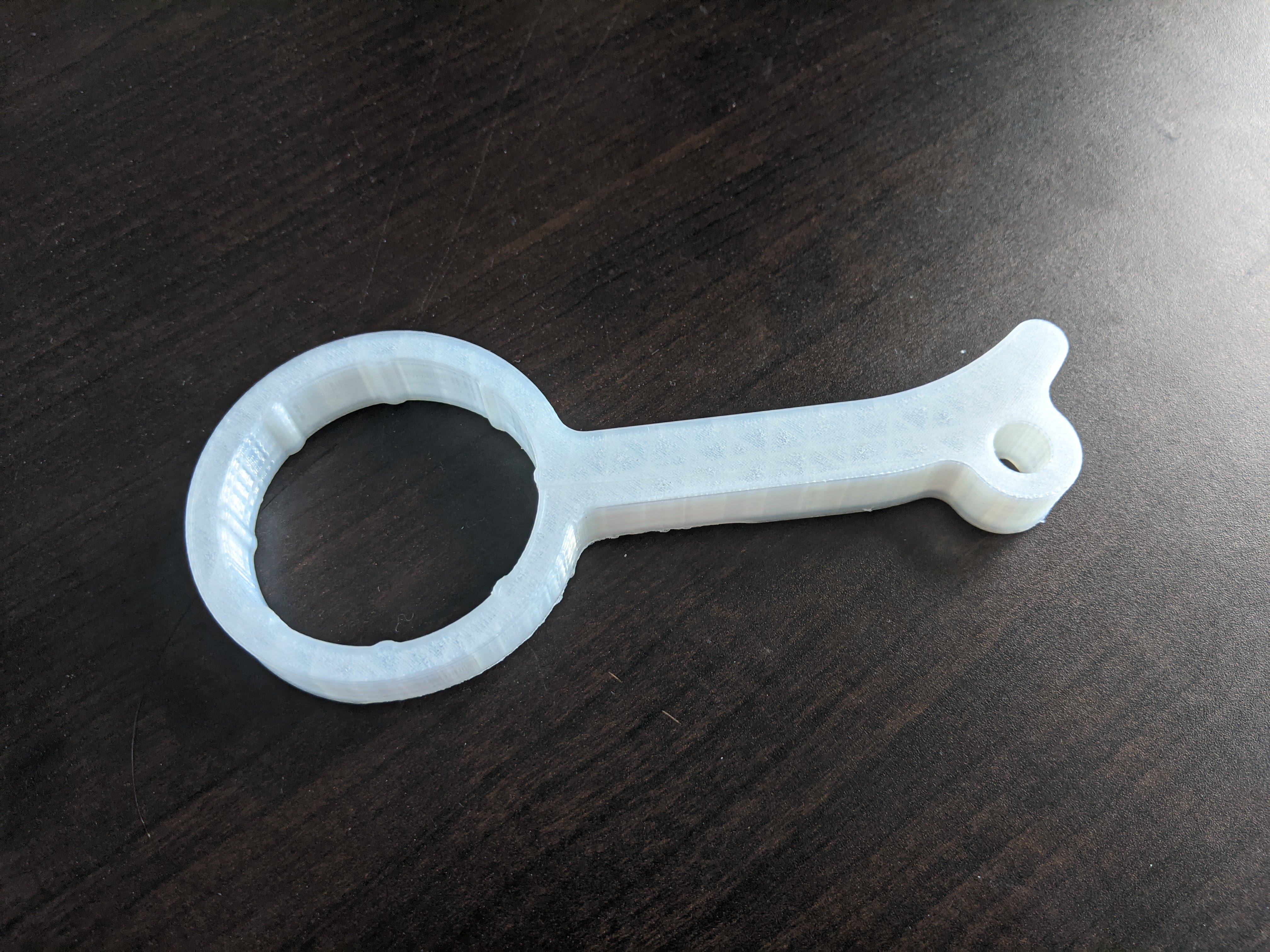  A variant larger in size to open the bottle with over-tightly sealed cap