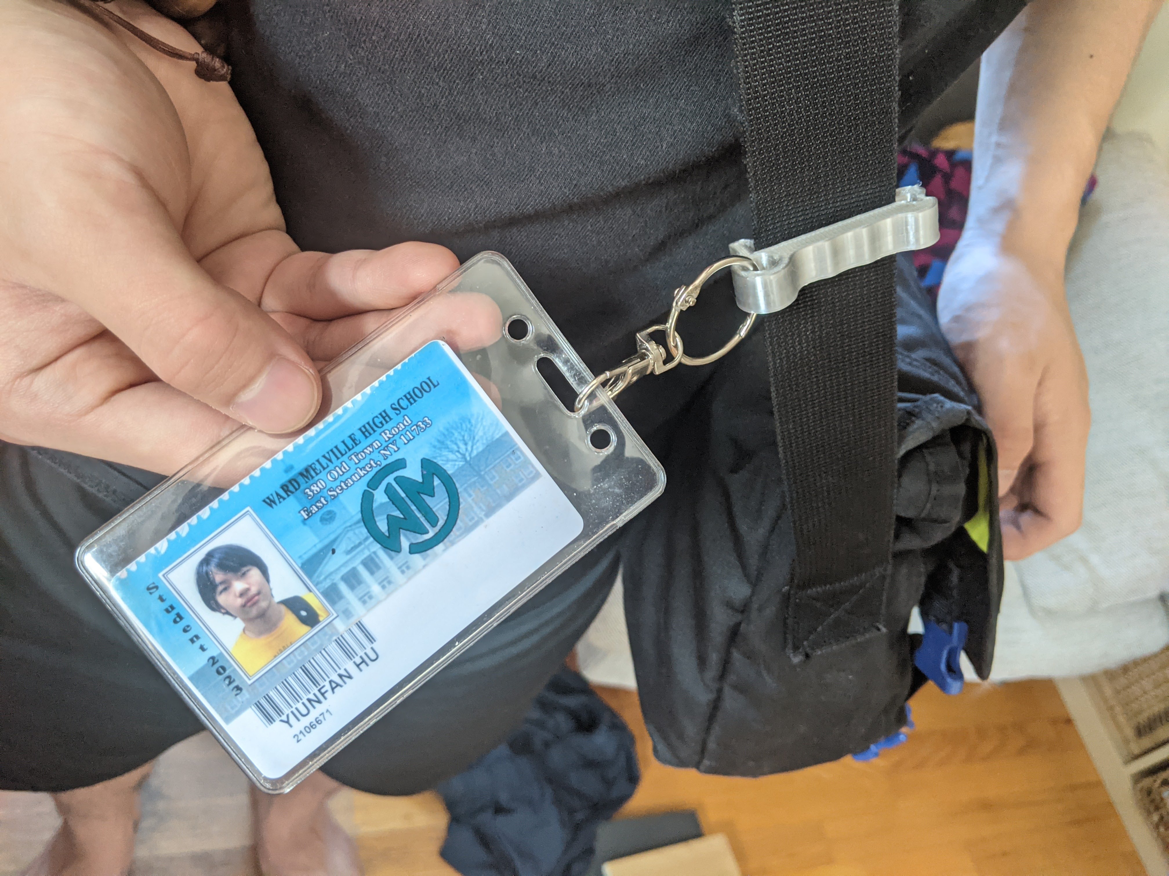 The clip holder with my school ID attached